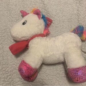 Adorable White Plush Unicorn with Pink and Rainbow Details